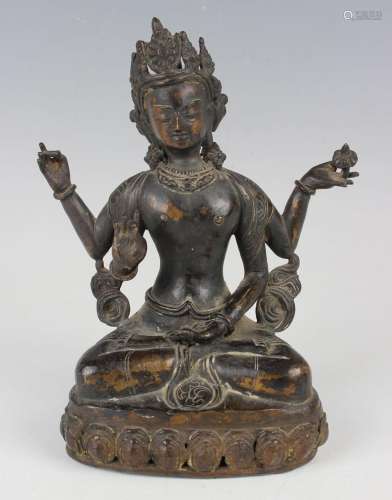 A Sino-Tibetan brown patinated bronze figure of Avalokiteshv...
