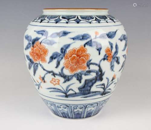 A Chinese underglaze blue and iron red decorated porcelain j...