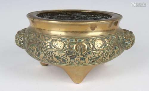 A Chinese bronze tripod censer