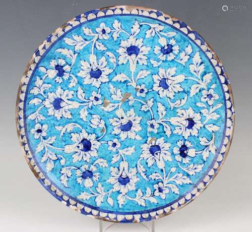 A Multan tin glazed earthenware circular dish