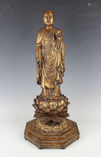 A Chinese carved giltwood figure of Buddha