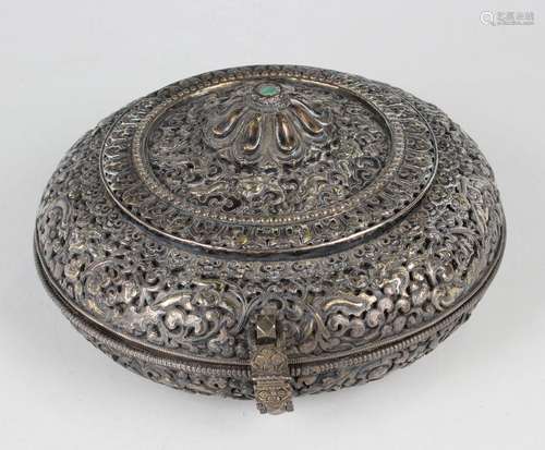 A South-east Asian white metal and parcel gilt circular box ...