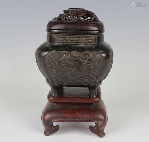 A Chinese brown patinated bronze censer of rounded square fo...