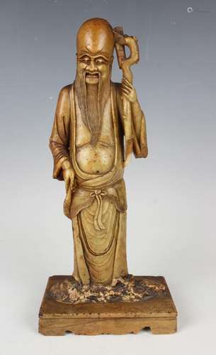 A Chinese carved soapstone figure of Shoulao