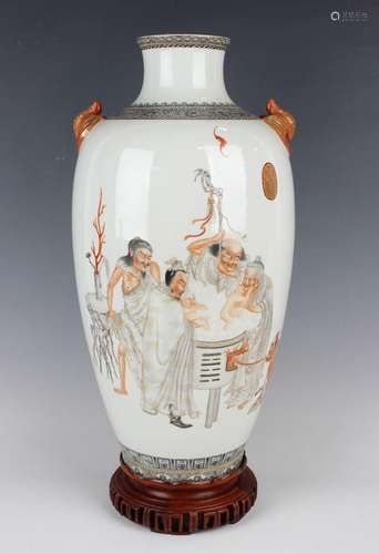 A Chinese iron red and en grisaille decorated porcelain vase