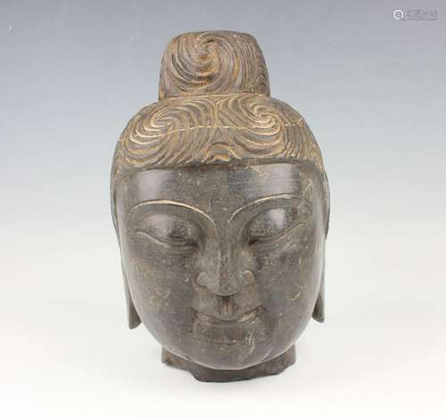 A Chinese carved stone Buddha's head