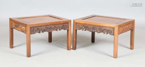 A pair of Chinese hardwood low tables