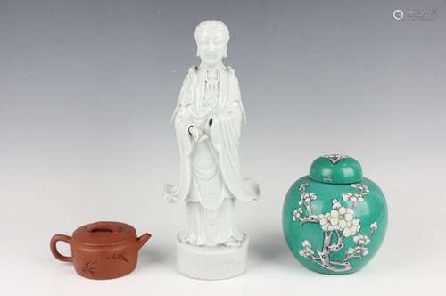 A Chinese blanc-de-Chine porcelain figure of Guanyin