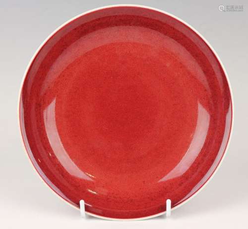 A Chinese sang-de-boeuf glazed porcelain saucer dish