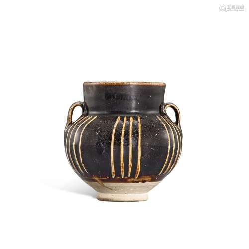 A small Cizhou black-glazed ribbed handled jar, Northern Son...