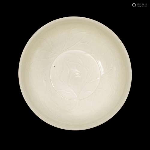 A superbly carved Dingyao 'lotus' bowl, Northern Song dynast...