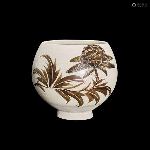 A large and superbly painted and incised Cizhou 'peony and b...