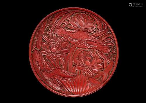 An important and exceptionally carved cinnabar lacquer 'lotu...