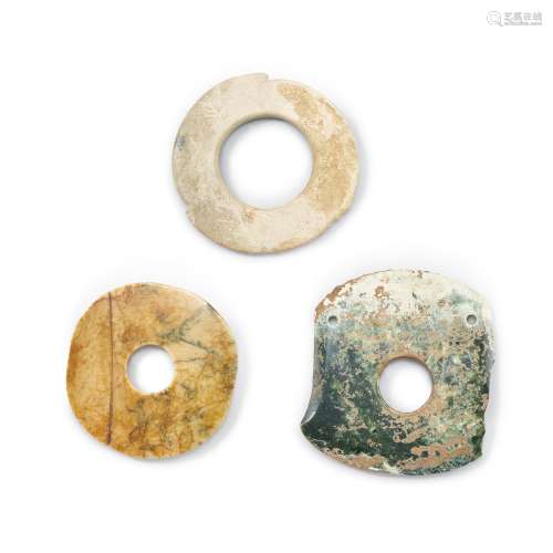 A group of three archaic jades, Neolithic period - Shang dyn...