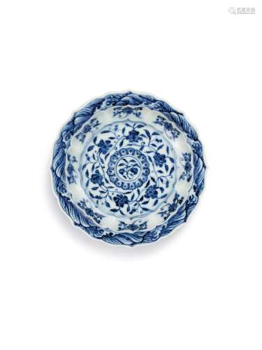 A fine and rare small blue and white 'waves' barbed dish, Mi...