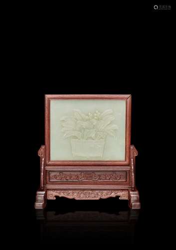 An imperial gilt-inscribed pale celadon jade 'evergreen' tab...