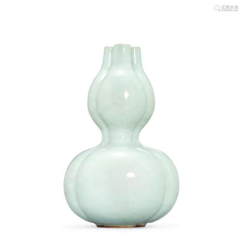 A Guan-type triple-spouted 'double-gourd' vase, Seal mark an...