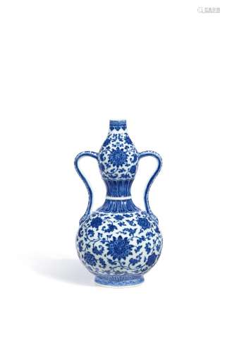 An extremely fine and rare blue and white double-gourd vase,...