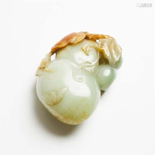 A Celadon and Russet Jade Carving of a Double-Gourd, 19th C