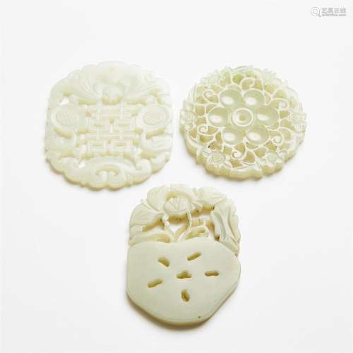 A Group of Three White Jade Reticulated Plaques, Ming/Qing