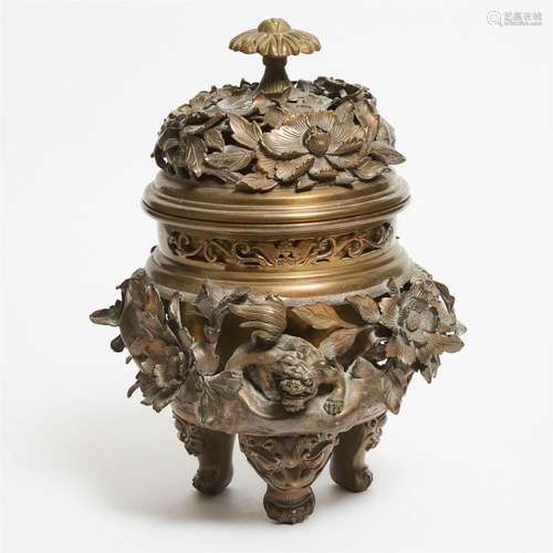 A Chinese 'Lions and Flowers' Tripod Incense Burner and Cov