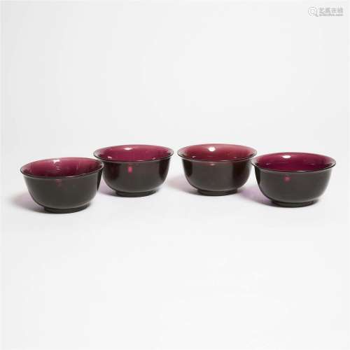 A Set of Four Aubergine Peking Glass Bowls, Early 20th Cent