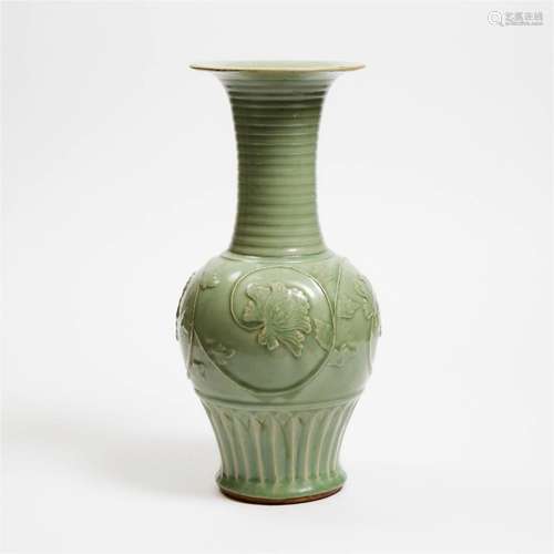 A Large Carved and Moulded Longquan Celadon 'Phoenix-Tail'