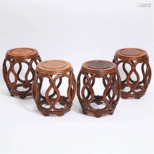 A Set of Four Chinese Ming-Style Hardwood Barrel Stools, Re