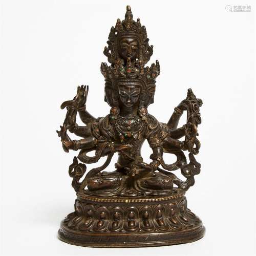 A Nepalese Bronze Seated Figure of Vasudhara Inlaid with Ha