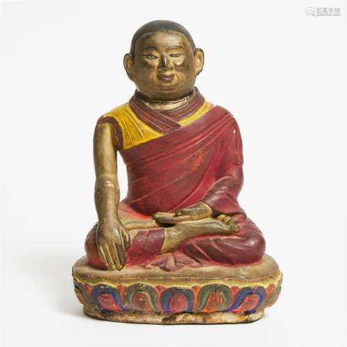 A Polychrome Terracotta Figure of a Monk, Tibet, 18th/19th