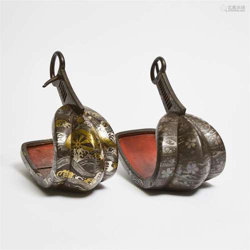 Two Japanese Gold and Silver Inlaid Iron Stirrups (Abumi),