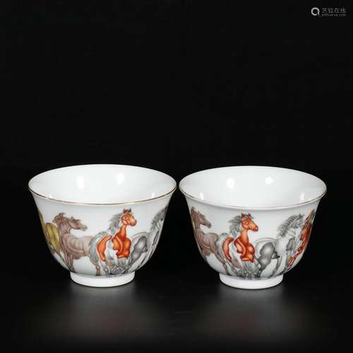 Pair of famille rose cups with eight steeds pattern