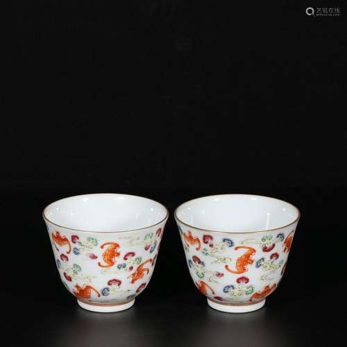 Pair of Pastel Cups with Clouds and Bat Patterns