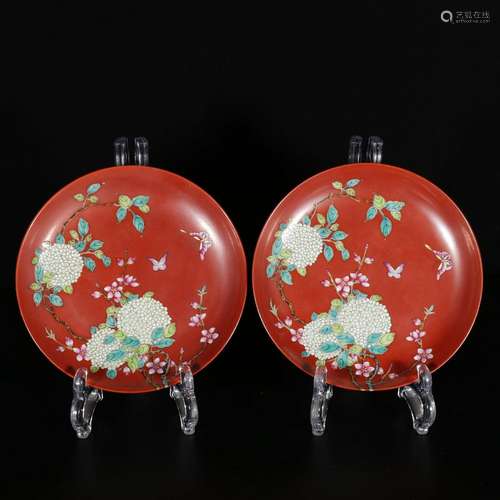 Pair of pastel coral red ground floral pattern dishes