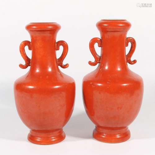 A pair of coral red amphora