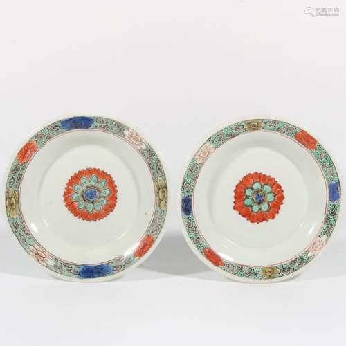 A pair of multicolored flower plates