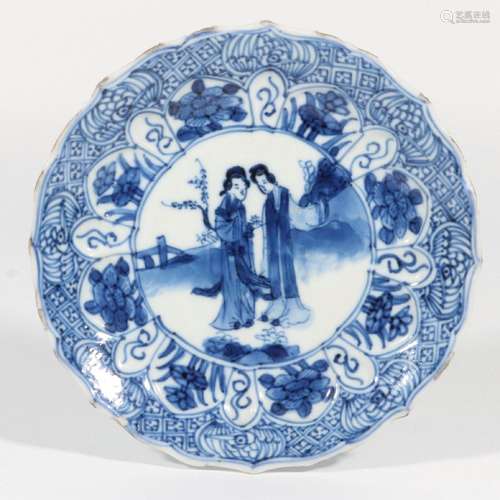 blue and white figure plate