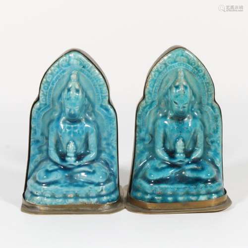 A pair of peacock blue Buddha