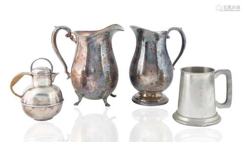 SET OF THREE SILVER-PLATED JUGS AND A METAL CUP HOLDER