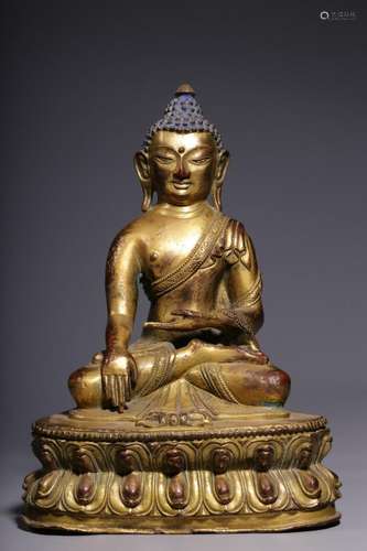 A gilt-bronze seated figure of Shakyamuni, Qing Dynasty