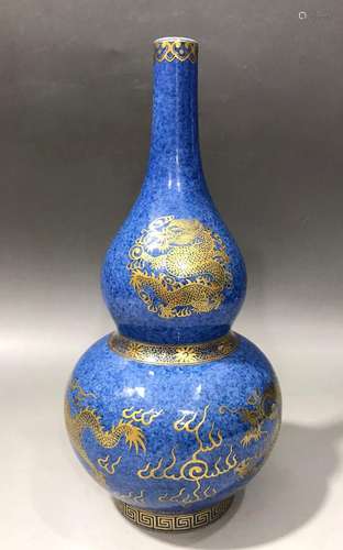 Gourd bottle with blue glaze and golden dragon pattern