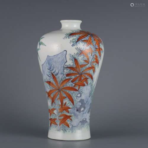 Plum vase with blue and white alum, red bamboo and stone pat...