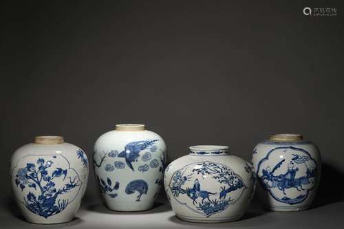 A SET OF FOUR QING KANGXI PERIOD BLUE AND WHITE JARS