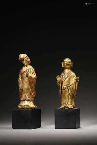 A PAIR OF GILT BRONZE BUDDA FIGURES