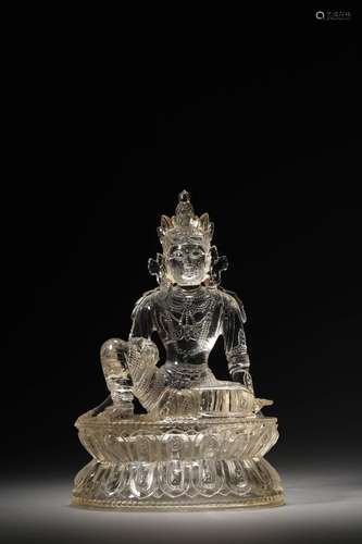 A CRYSTAL BUDDA FIGURE