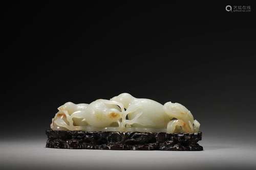 A WHITE JADE CARVING