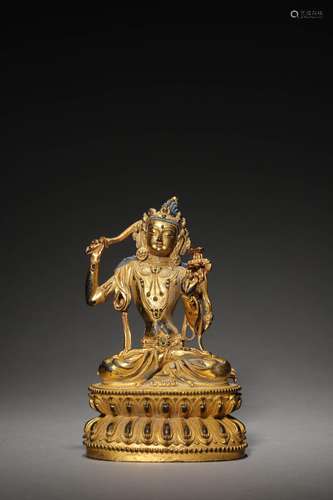 A MING GILT BUDDA FIGURE