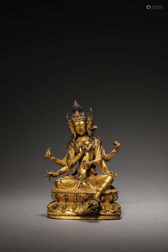 A MING BUDDA GILT BRONZE FIGURE