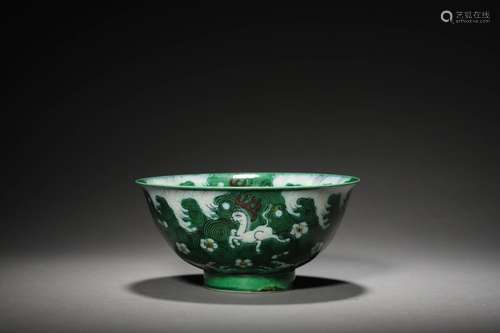 A GREEN GLAZED BOWL