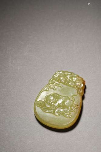 A QING YELLOW JADE CARVING